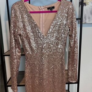 Check out this LuLu’s Rose Gold long formal gown. Perfect for all events!